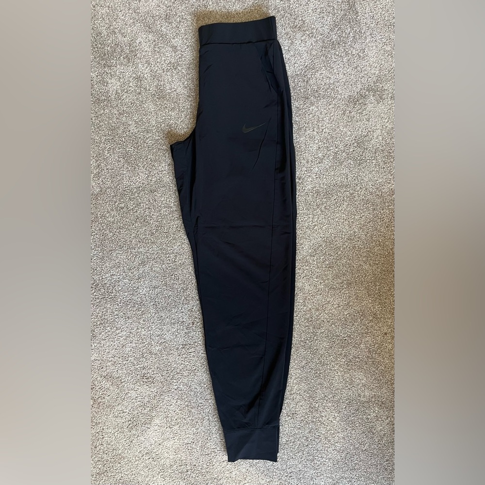 Nike light weight nylon joggers.